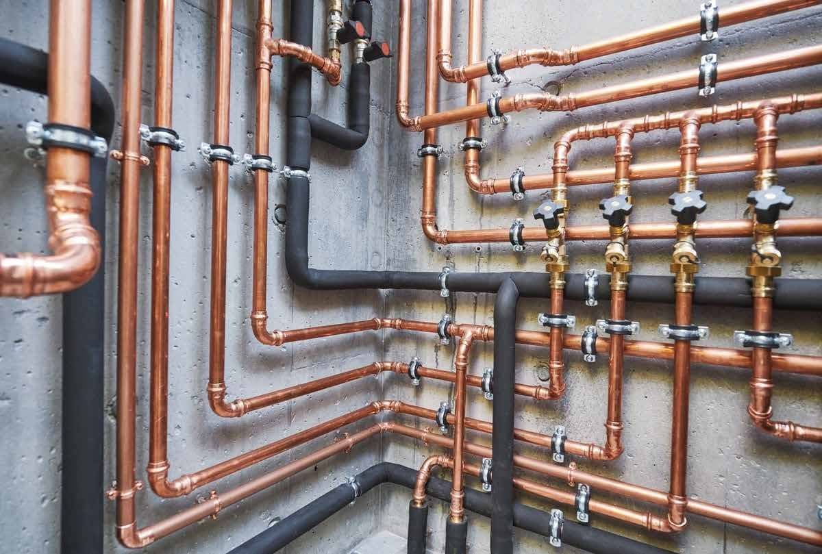Commercial copper pipe and valve assembly installed by DUO Mechanical